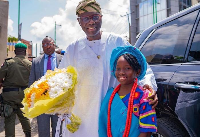 Gov Sanwoolu and Oluwafeyikemi Obadan last week at the 39th Bishop Conference of Methodist Church, Tinubu after presentation of the Bouquet