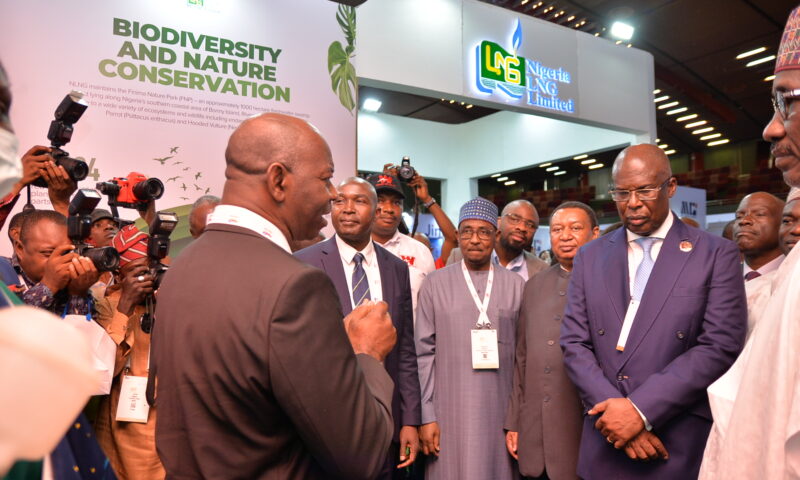 Chief Timipre Sylva; Secretary-General of OPEC, Mohammed Barkindo; and NNPC’s GMD, Mele Kyari at NLNG’s Exhibition stand, Nigeria Oil & Gas Conference (NOG) 2022