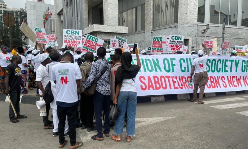 Groups Picket Lagos Commercial Banks Sabotaging Access To New Naira Notes